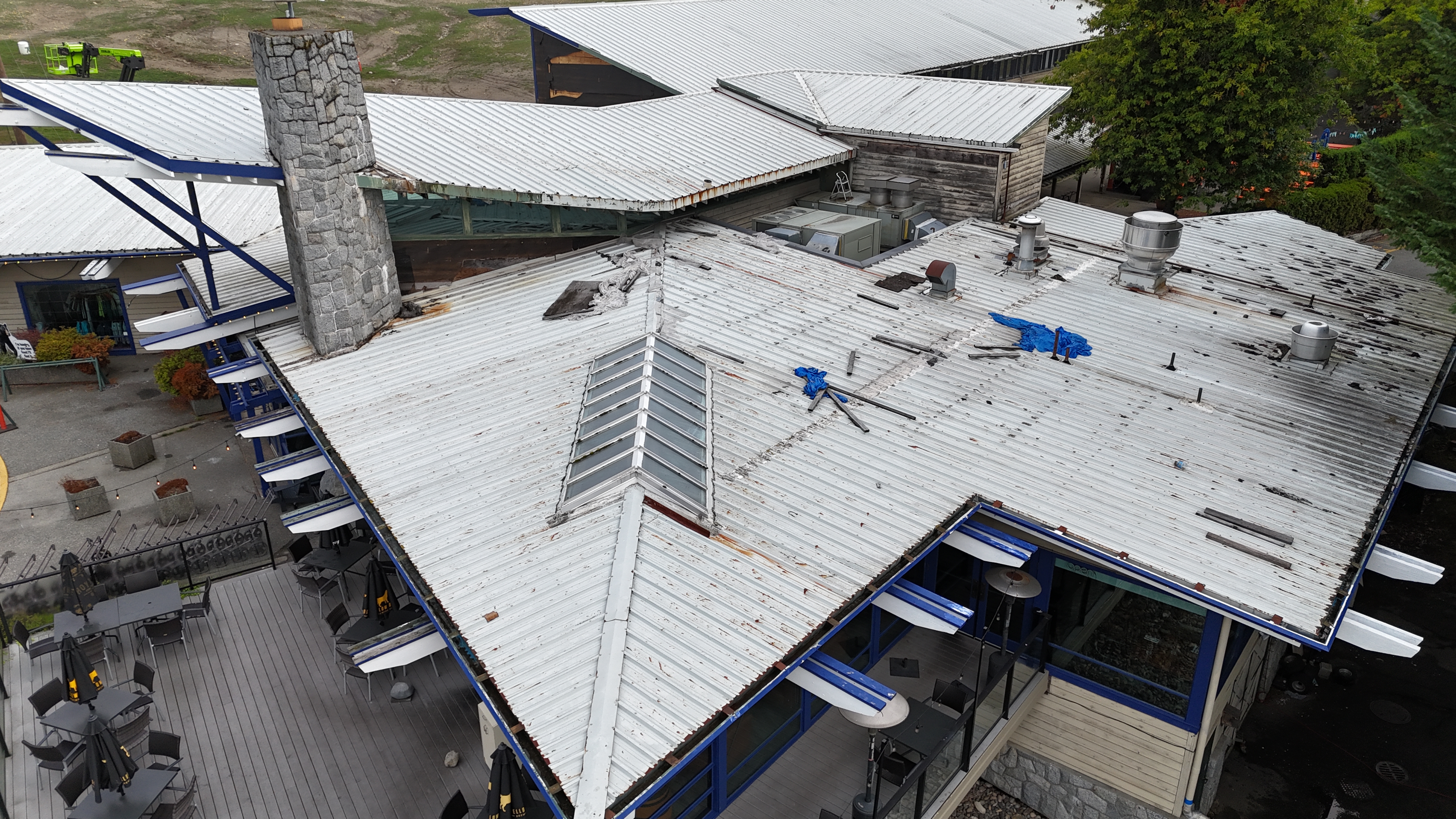 Exposed fastener metal roof conversion to standing seam 4 Gauge - Before